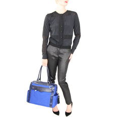 walter baker blouse yoana baraschi tuxedo pants rebecca minkoff blue bag